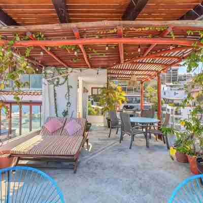 Sunsets + Ocean View Condo with WiFi, A/C, RoofTop, steps to Malecon and Beach Others