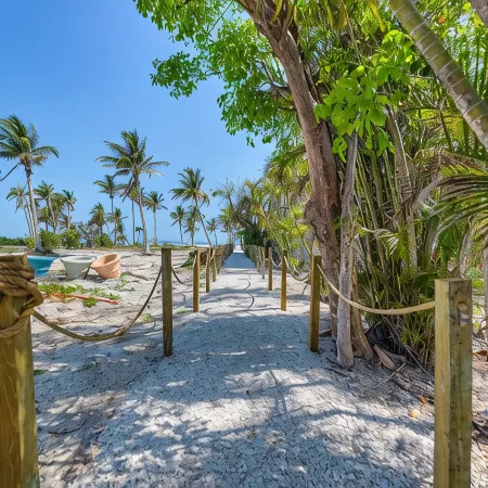 Tropical Garden Condo Just Steps to Sanibel Beach