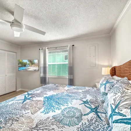 Perfect location Walk to the village and beach Private Balcony Heated Pool