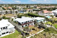 Beachfront Villa with Heated Pool Mini Golf Fire Pit and Spacex Views