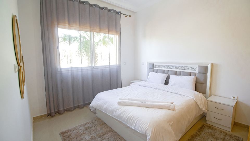 2-Bedroom Apartment with Balcony & Pool