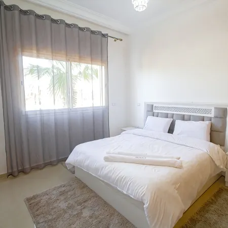 2-Bedroom Apartment with Balcony & Pool