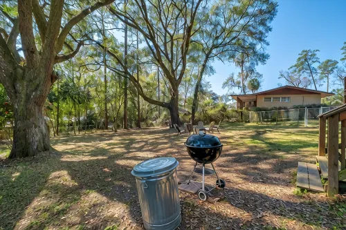 HUMMINGBIRD HAUS \\ 6 Bedrooms \\ Mid-Century \\ 2-Unit Home \\  2 Kitchens - balcony