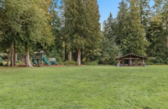 Spacious remodeled home with central AC and fenced yard