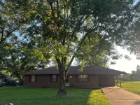 Spacious 4-bedroom house in Columbus with privacy fence situated in the county! - 3-Star