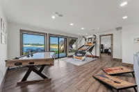 Modern 6BR Lakefront Escape • Private Beach • Sleeps 20 • Pets+ • Dells 30min