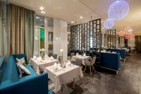Hotel Platzhirsch - 早餐