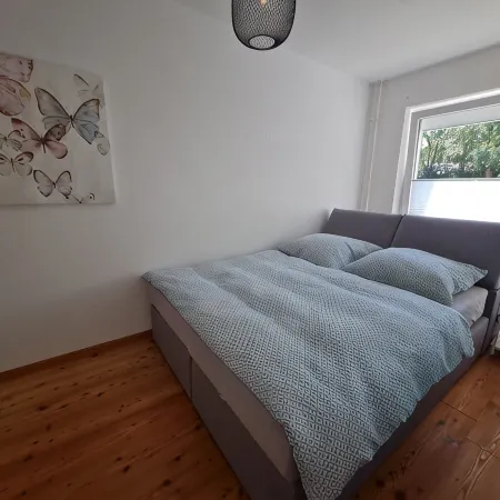 Modern city apartment with balcony and private parking space in a quiet location
