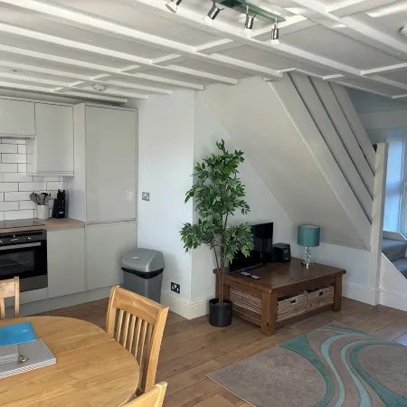 Barn conversion overlooking the golf course to the sea