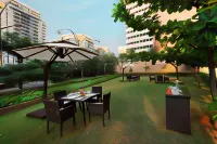 Crest Executive Suites, Whitefield Отели в г. 