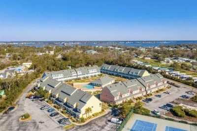 First Floor Coastal Comfort in Oceanfront Complex with 3 pools