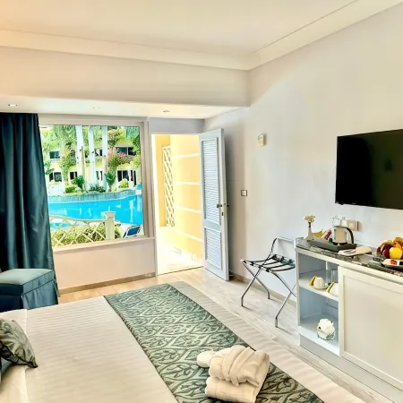 Paradise Inn Beach Resort Отели рядом с достопримечательностью «Пляж Мамура»