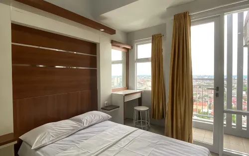 Apartemen VidaView by RoomForRent - balcony