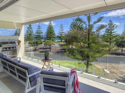 Beachside 880 beachfront luxury Apartment with Sunset views from the balcony.