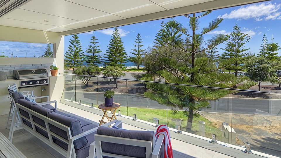 Beachside 880 beachfront luxury Apartment with Sunset views from the balcony.