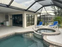 RUM CAY GETAWAY: South facing waterfront home, private pool/spa, bar, and dock. - Hot Tub