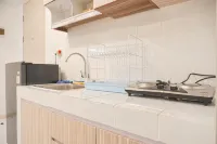 Tidy and Homey Studio at Tokyo Riverside PIK 2 Apartment By Travelio