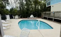 Beautiful home on the river, mins to the Gulf; fire-pit, bar, view