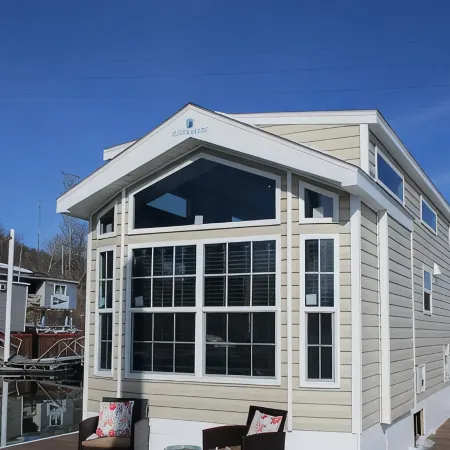Near Pittsburgh on Beaver River Waterfront -- Glamping in Cozy Floating Cottage