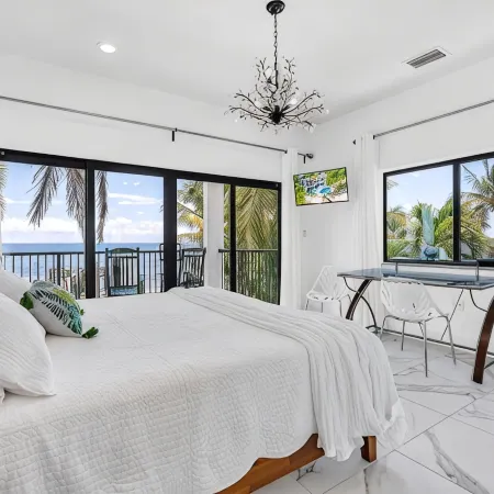 Wide Horizon oceanfront.  4 bedroom, 4 ½ bath,  kayaks, pool + observation deck.