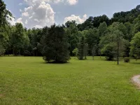 Our creekside cabin is nestled deep in the country on a secluded lane. - 3-Star