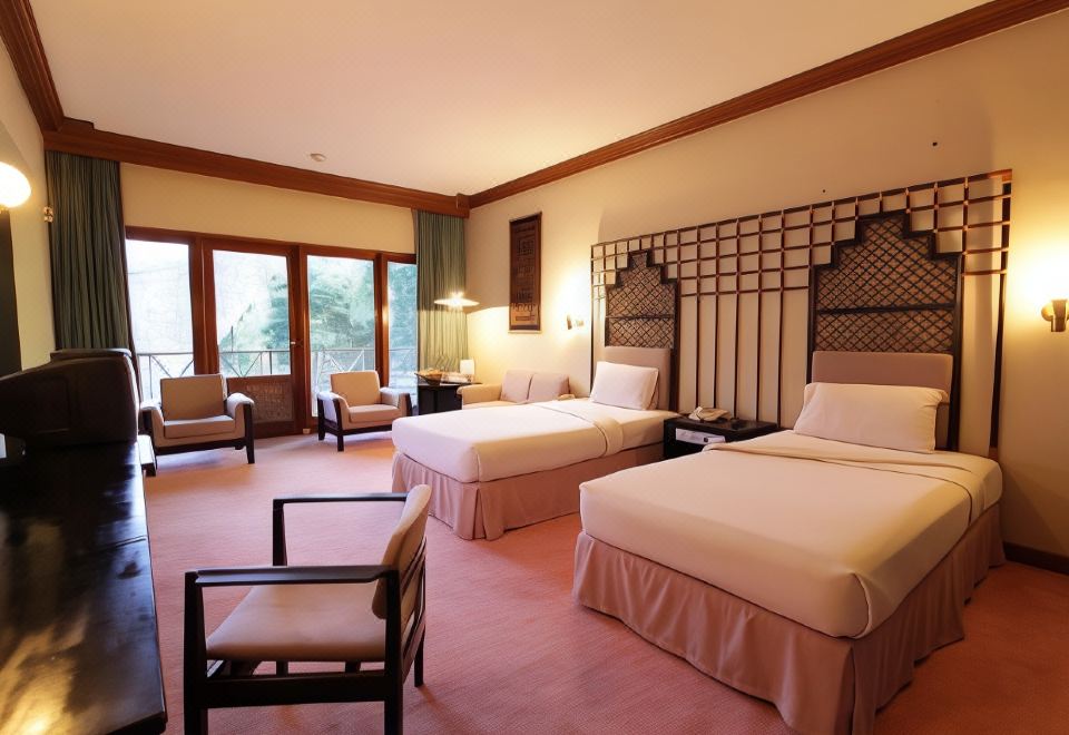 호텔 사히드 토라자 야외 수영장과 정원