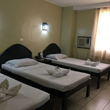 Sampaguita Suites Plaza Garcia Отели рядом с достопримечательностью «Магелланов Крест»