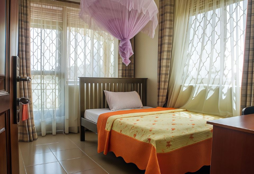 Tropical Suites Hotel - Housity