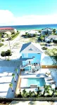 UPDATED BRAND NEW RENTAL, STEPS TO THE GULF W/VIEWS, NEW POOL PING PONG SLEEPS 9