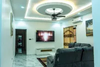 Charming 2-bedroom apartment with AC, WiFi along with security agent in Lome.