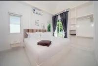 ทรอปิคอล โอเอซิส อ่าวยน บีช เฮาส์