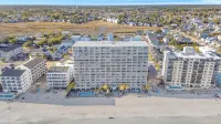 Serenity By The Sea: Modern Beachfront Condo with Stunning Views