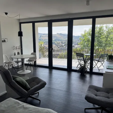 Chic apartment in a central location with a large balcony and views over the city