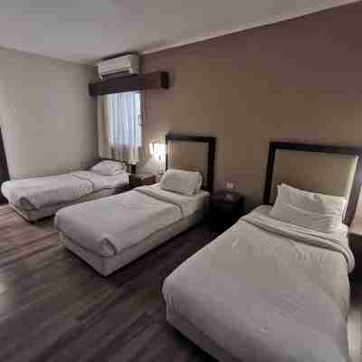 Green Plaza Inn Rooms