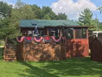 Indian Lakes Cabin with private beach and dock lake side