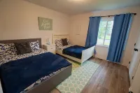 Welcome to “Persimmon Grove” the Cozy Farmhouse with Modern Amenities