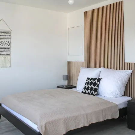 Close to the city center, with balcony, parking space and charging station
