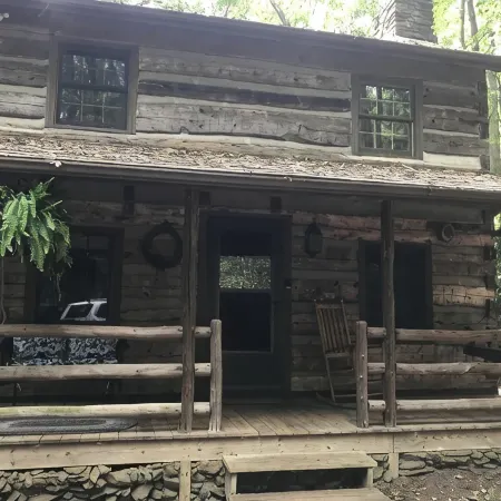 Come to the mountains to a rustic cabin by a creek.