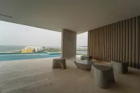 Apartamentos Cerca Al Mar - インフィニティプール