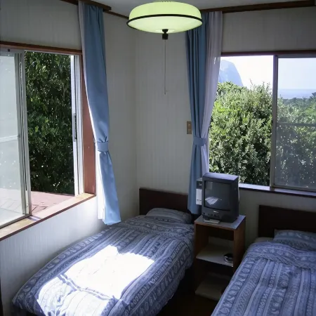 Pension Blue Marlin(Hachijojima) Отели в г. Хачиджо Джима