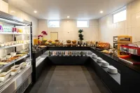 Commodore Airport Hotel Christchurch - servizio colazione