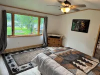 Welcome to Shangri-Lodge Your 2 cabin retreat on a family friendly lake.