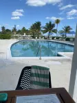 Charming beach front condo, Freeport ,Coral Beach, with AC/WiFi, salon/spa, pool - Uima-altaat