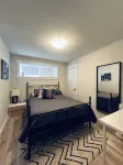 The Governor's Suite - An executive oasis featuring a hot tub, fire pit and BBQ!