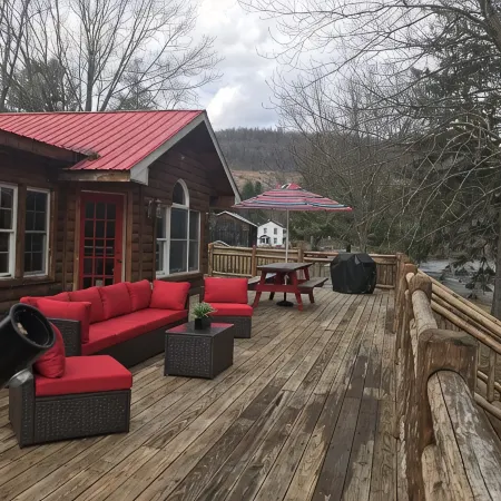 Spectacular Catskill Mountain River Front Custom Log Home