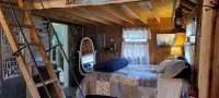 Wood Haven Lodge. Secluded, cozy log cabin in Northern Michigan. - Wifi