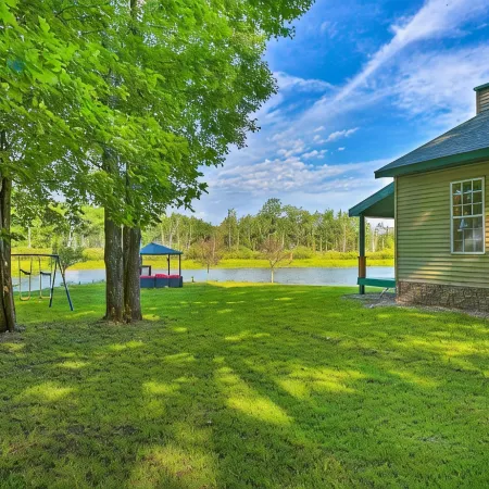 Private Cadillac Gem w/ Kayaks, Hot Tub, Pond, Pool Table and More