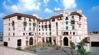 Ramada by Wyndham Lahore Gulberg II Hotels near Jamia Masjid Rehmania, Green Town