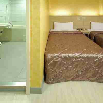 世國商旅 Rooms