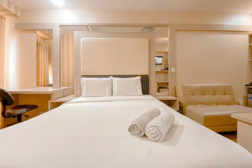 Warm Tone Studio at Candiland Apartment By Travelio